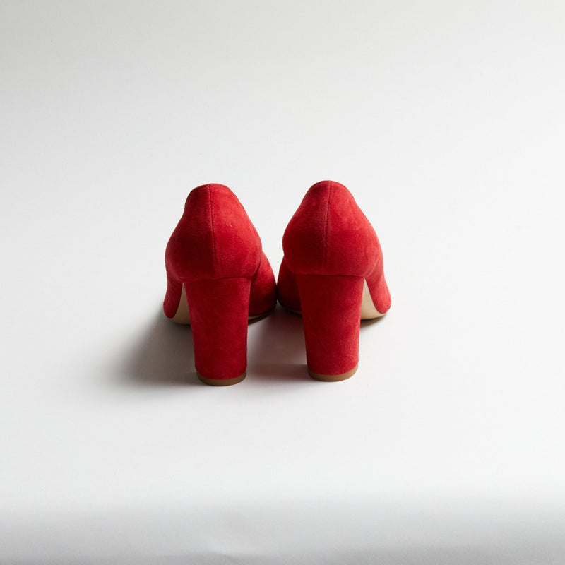 Red Luna Selene block heel pumps on a white background