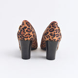 Back view of the Veronica Leopard Pump with genuine leopard print Italian suede leather, black block  heels, and Italian craftsmanship